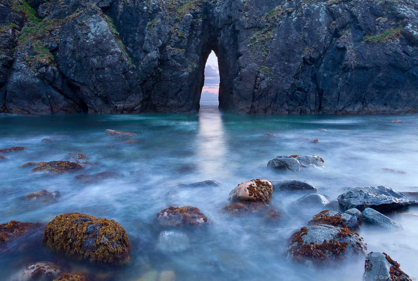 A sea arch along a beach near Bookings Oregon.