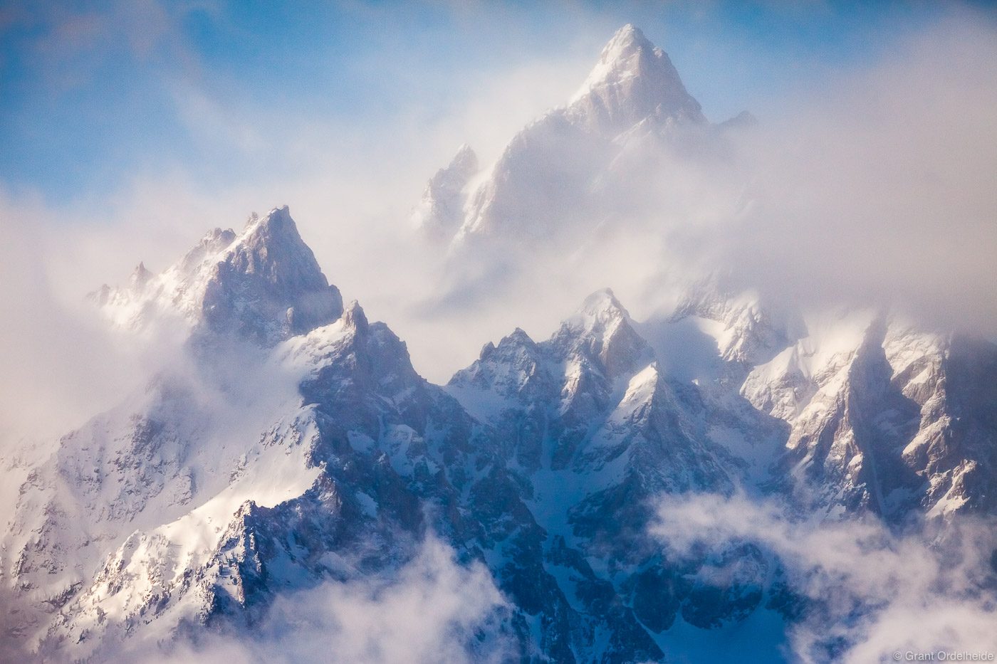 A clearing winter storm from the Cathedral Group which features Teewinot, Grand Teton, and Mount Owen.
