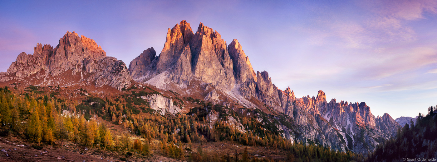 Sunrise on the Cadini Group in Italy's Dolomite mountains.