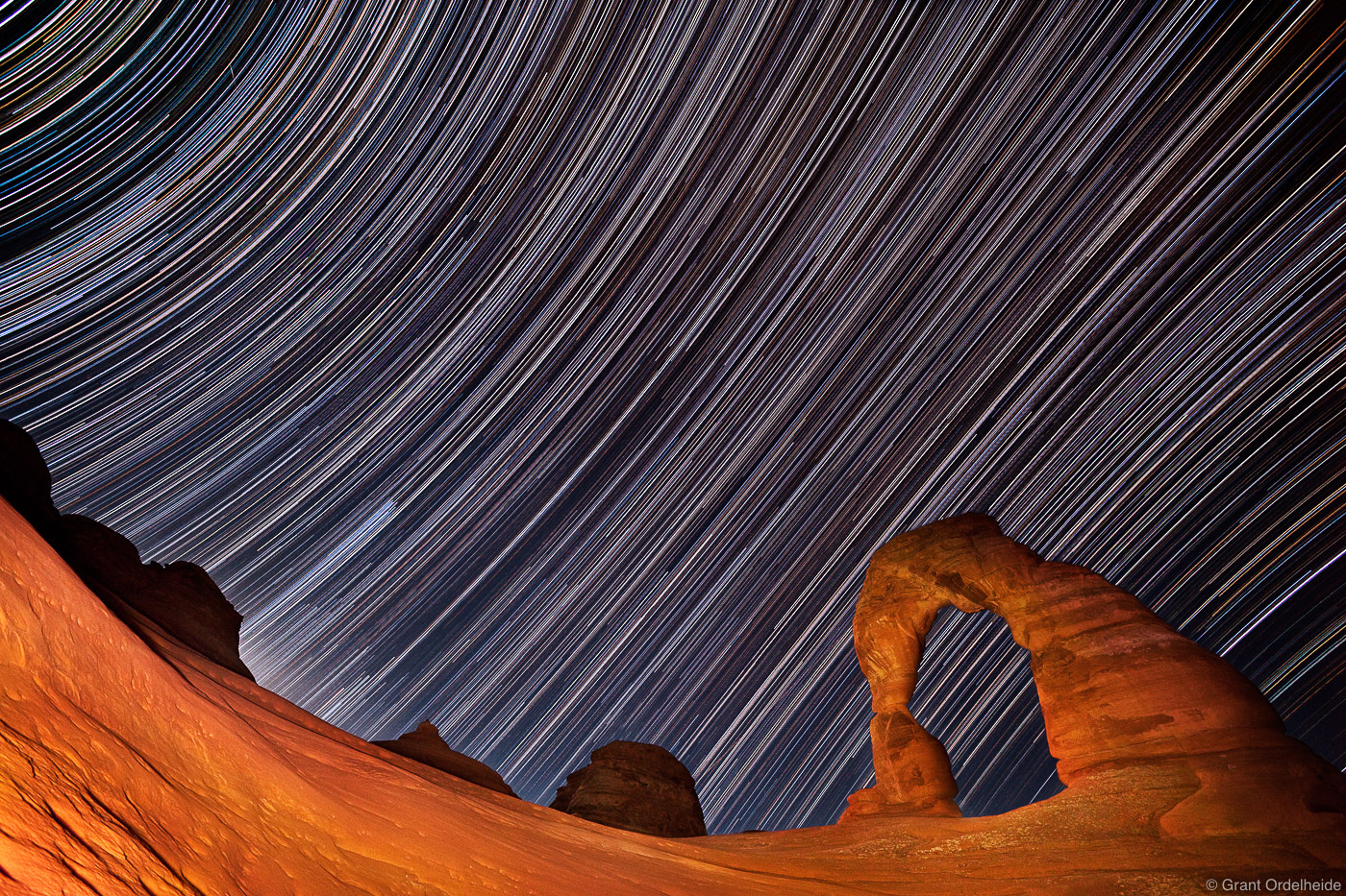 Star trails above the iconic Delicate Arch in Arches National Park.