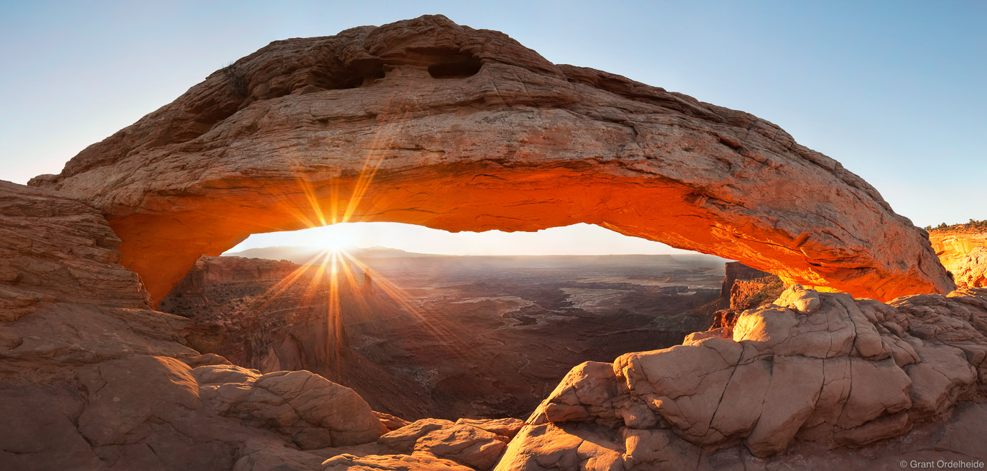 Sunrise at Mesa Arch in the Island In The Sky section of Canyonlands National Park.