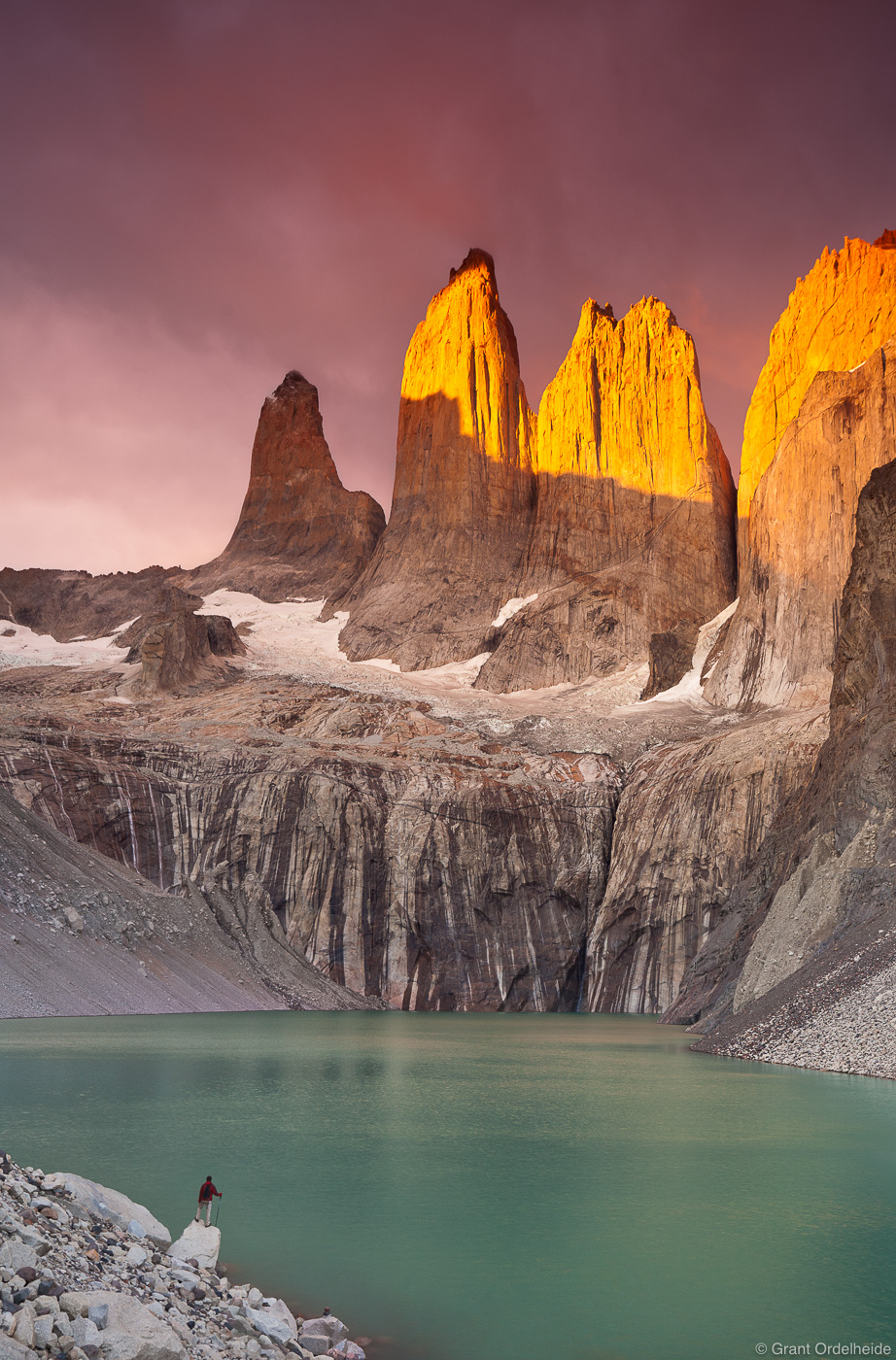 A person below the iconic Towers in Torres del Paine National Park.