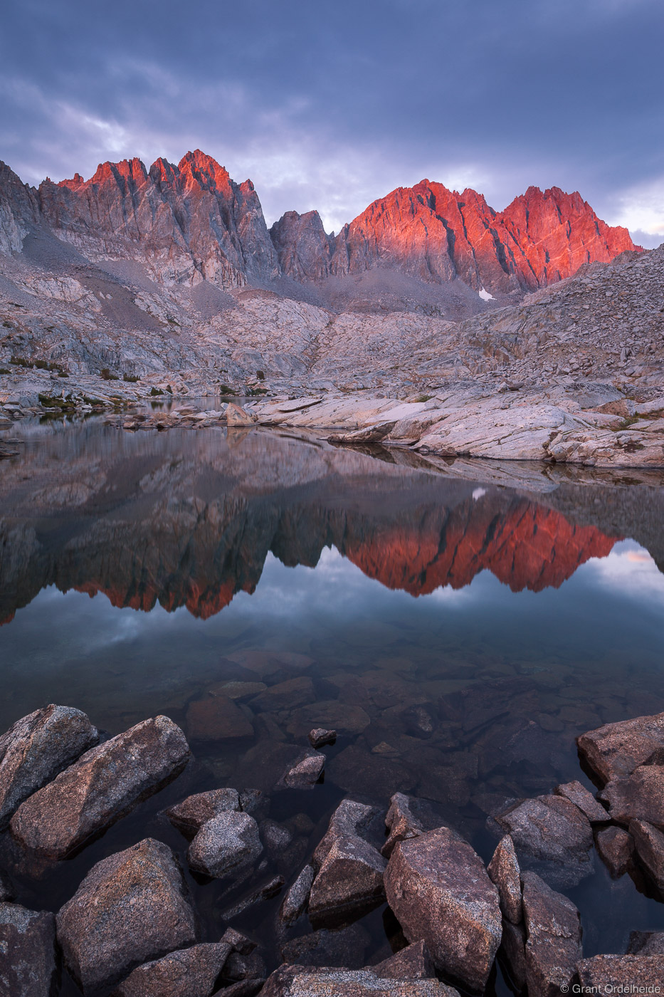Sunset on the Palisade mountains reflected in an Dusy Basin&nbsp;alpine lake high in California's Kings Canyon National Park.