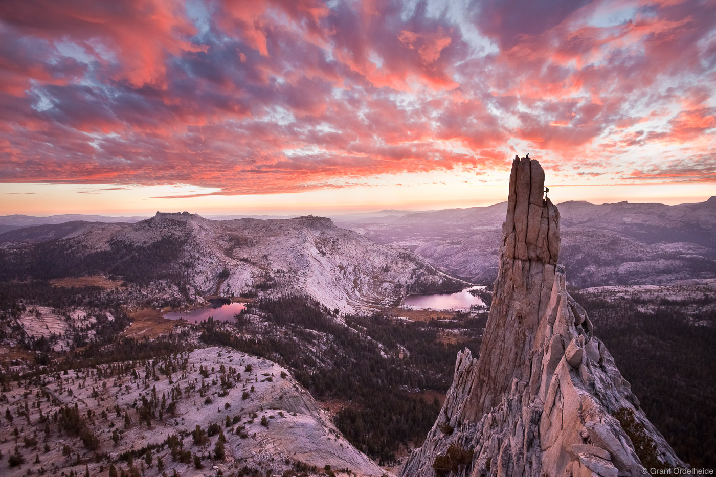 Climbers rappelling off of Eichorn Pinnacle in Yosemite. The pinnacle which lies on the western flank of Cathedral Peak above...