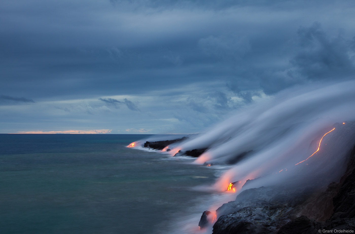 Lava from the Puu Oo volcano enters the Pacific Ocean