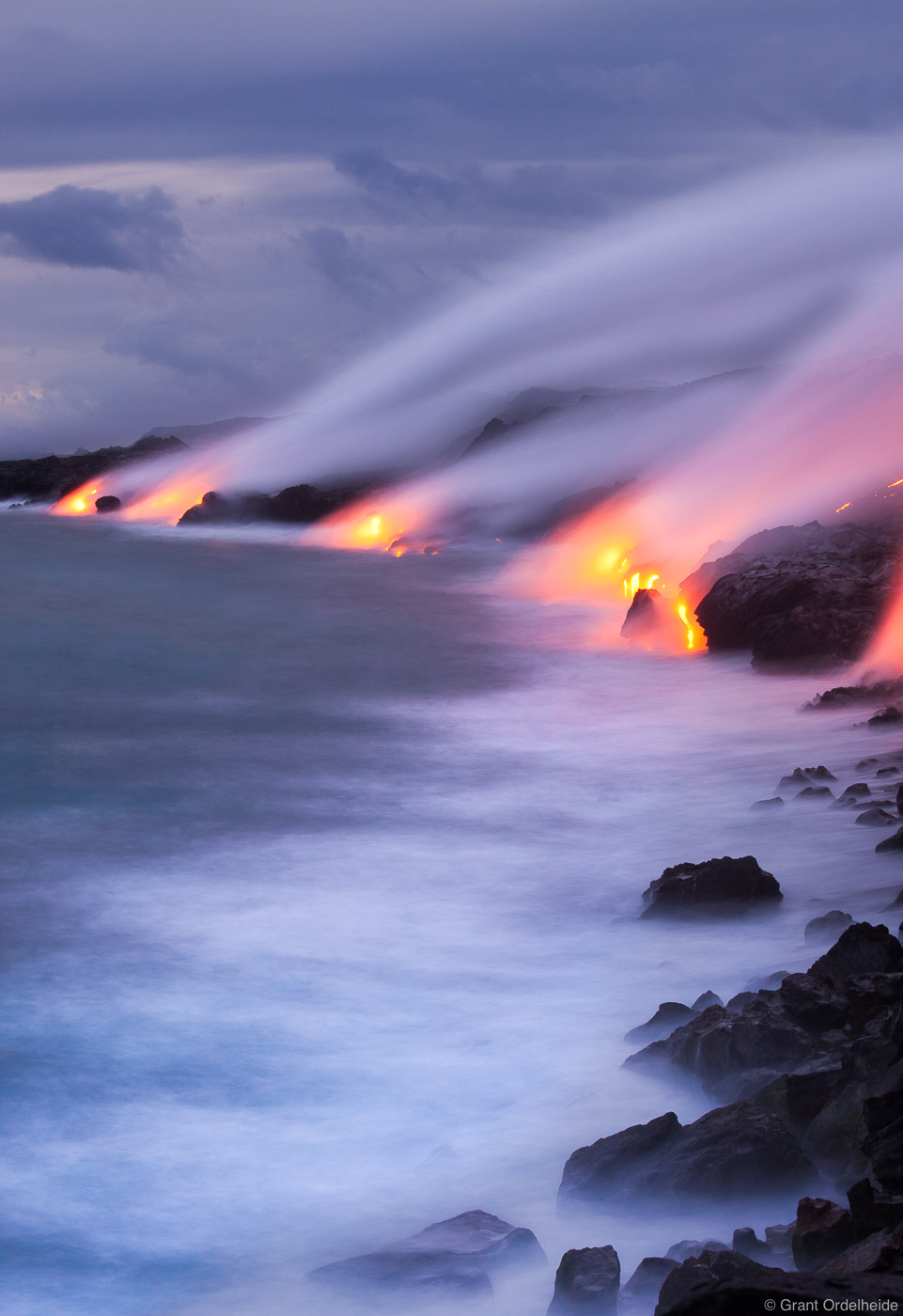 Lava flows into the Pacific Ocean from the Puu Oo vent on Hawaii's Big Island.