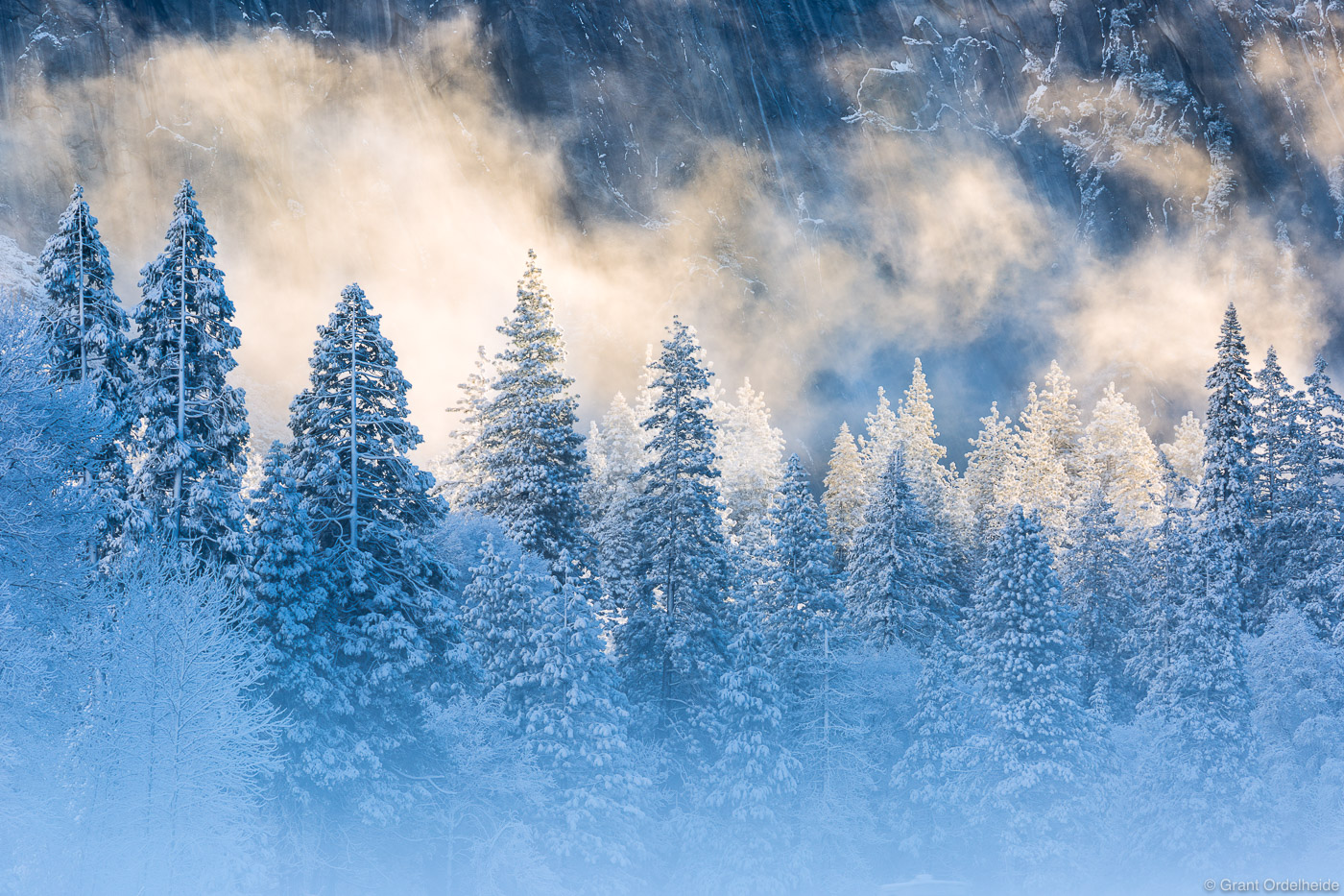 Early morning mist and light after a snowstorm in Yosemite Valley.