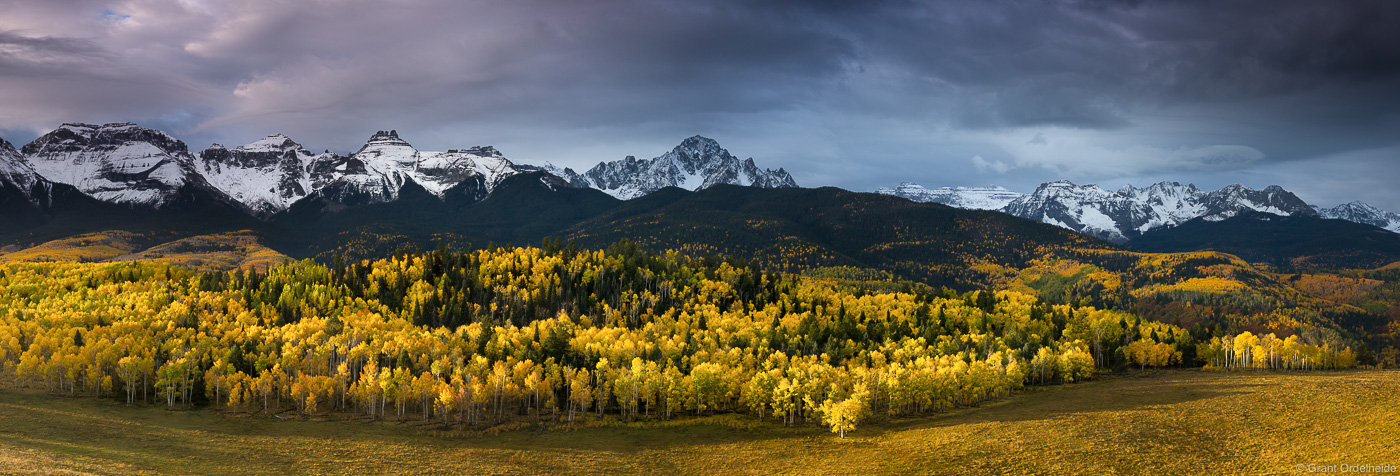 A stormy morning over golden aspens and Mt. Sneffels near Ridgway Colorado.