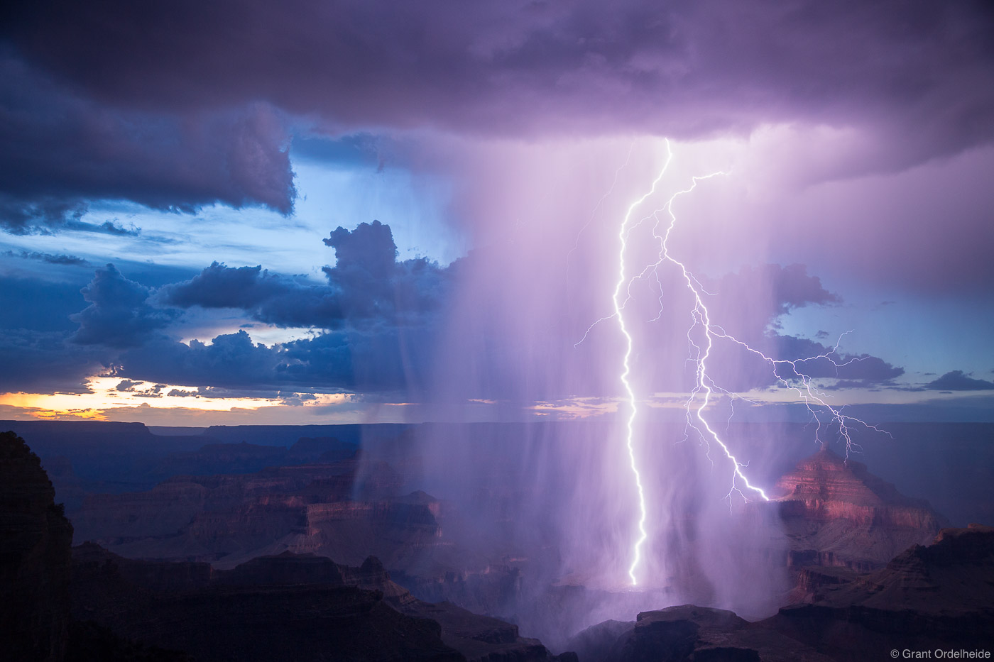 A lightning bolt touches down near the South Rim of the Grand Canyon.