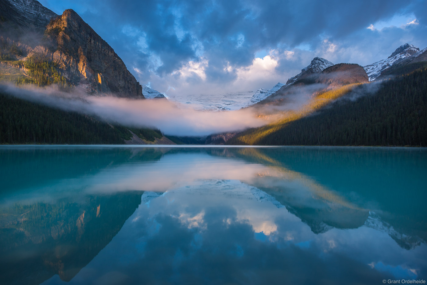 A foggy morning at the iconic Lake Louise in Alberta, Canada.