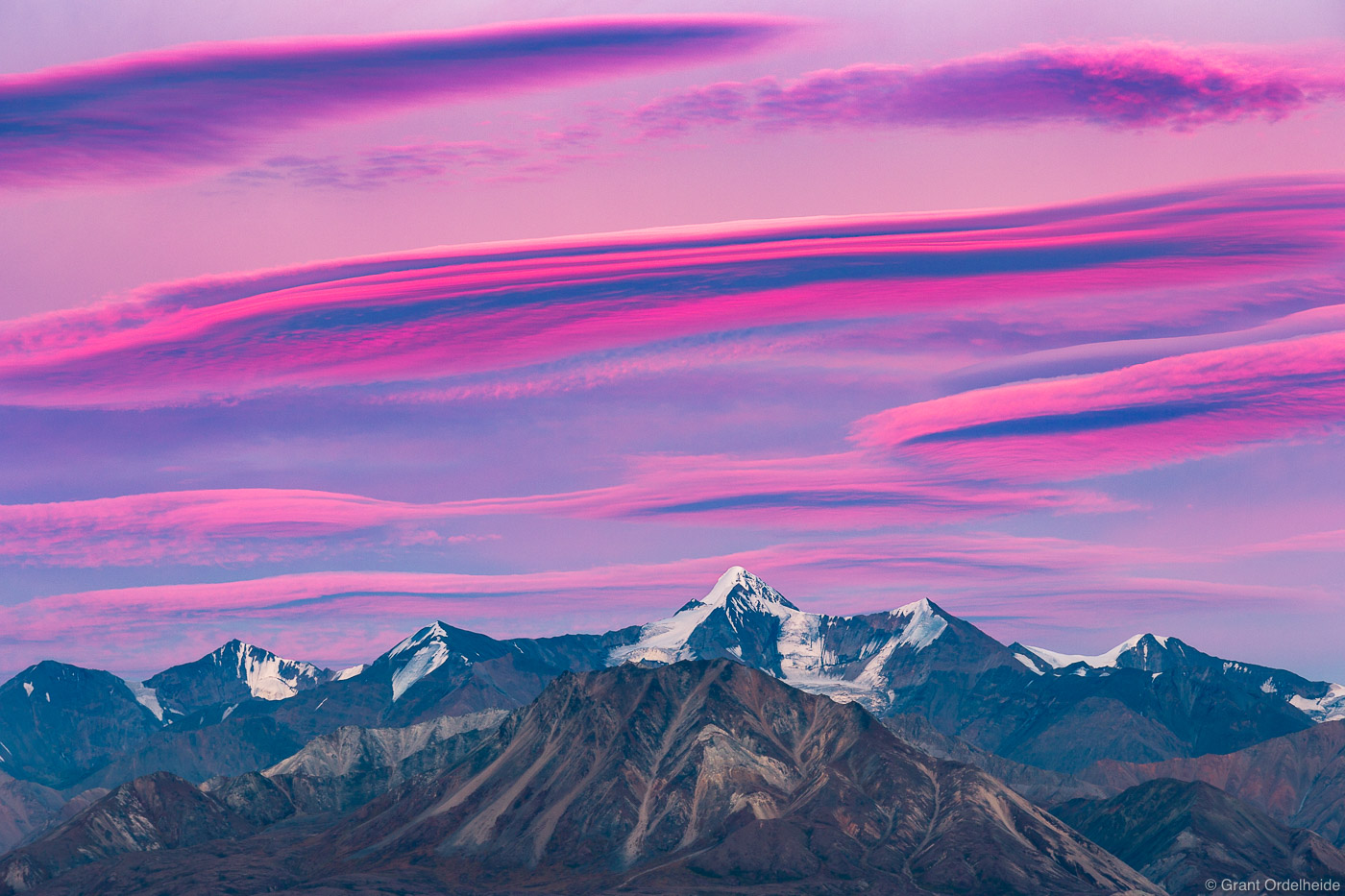 Lenticular clouds at sunset over Denali National Park.