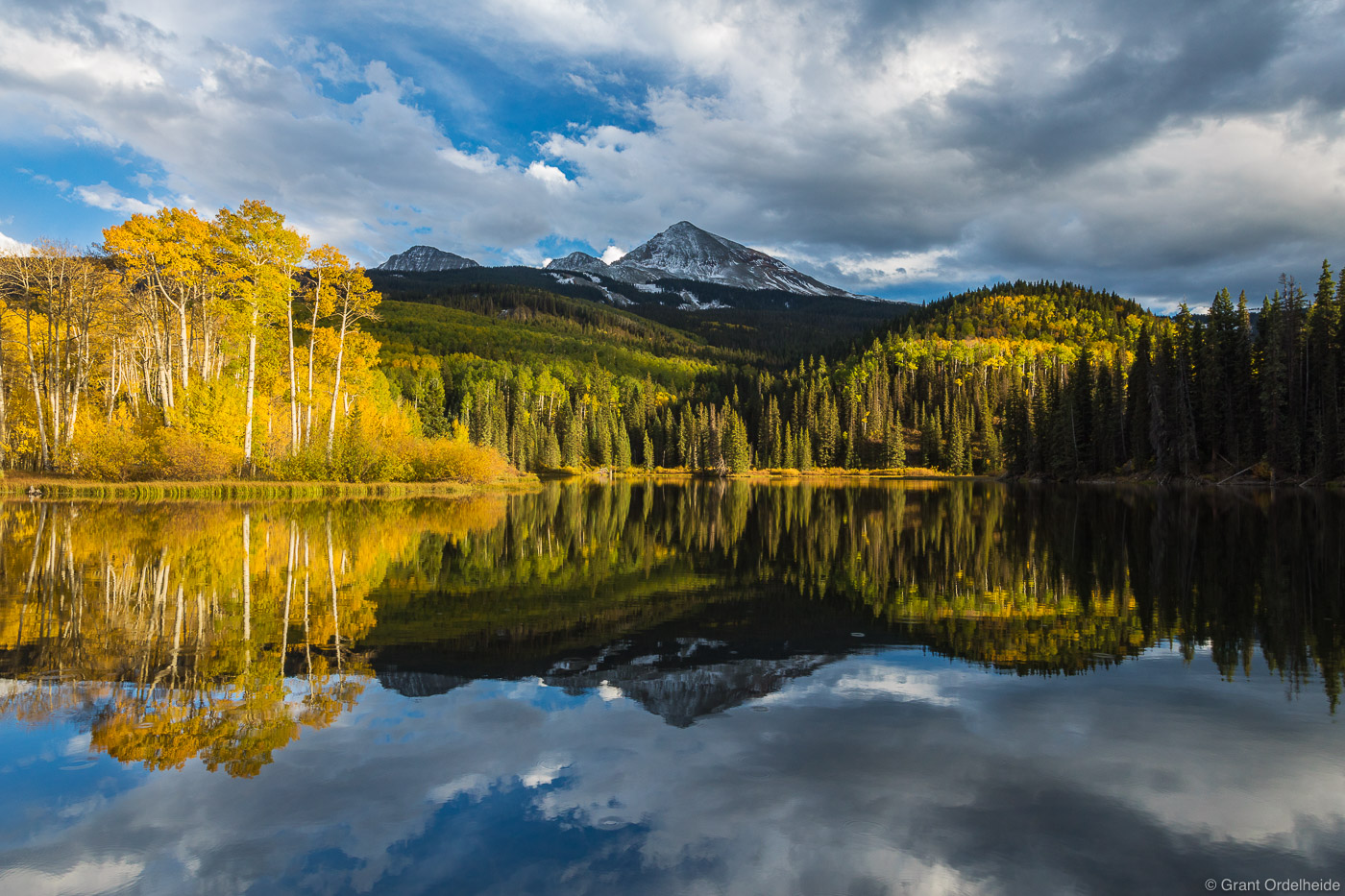 Fall color reflected in Woods Lake near Telluride, Colorado.