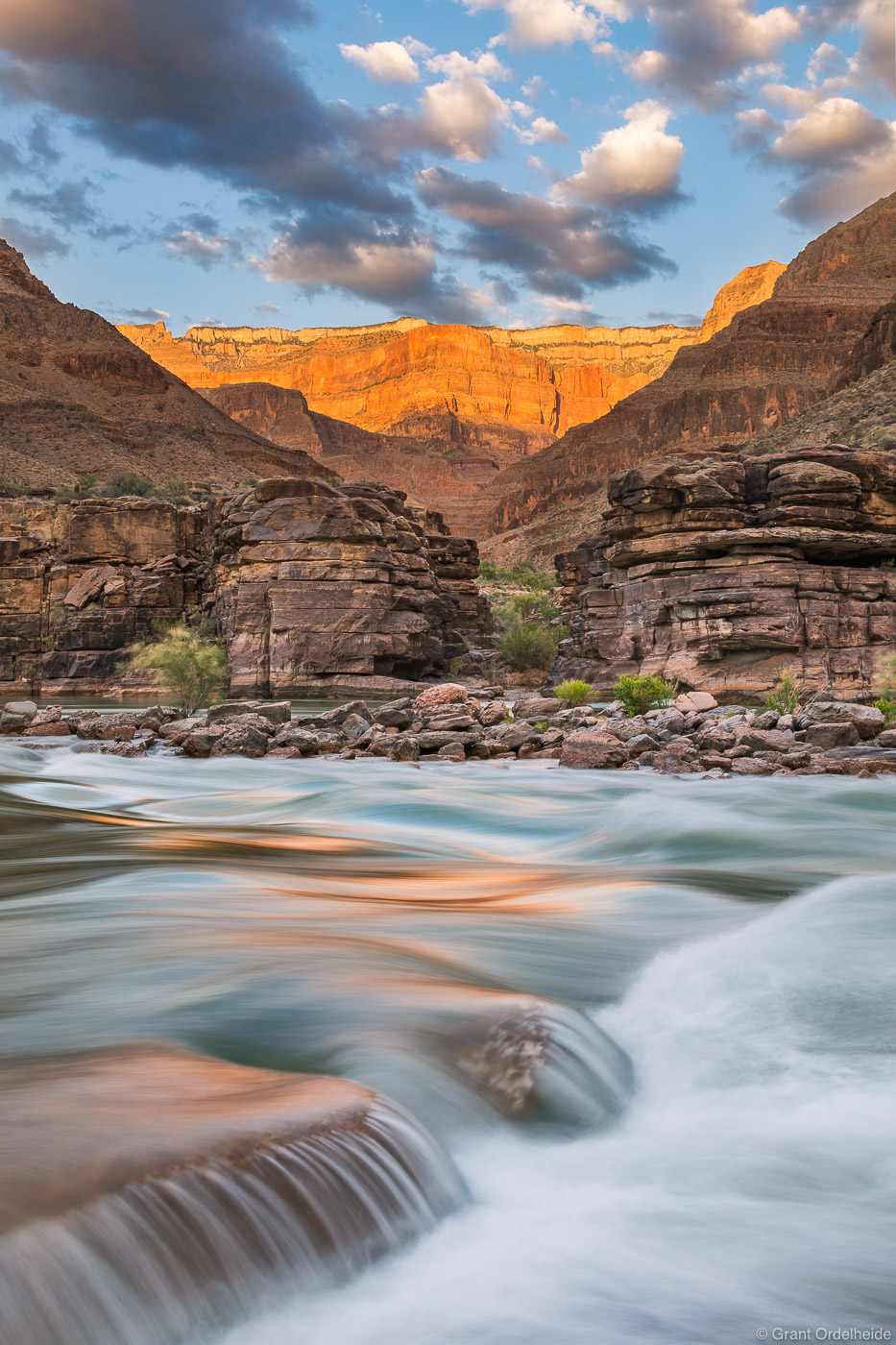 A view from the Colorado River through all the different layers of rock that make up the Grand Canyon.