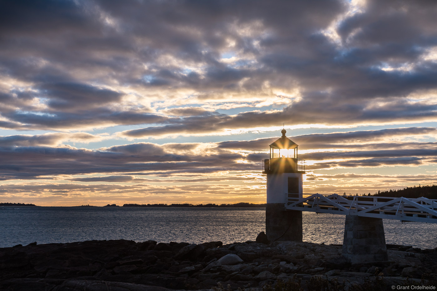 Sunset over the Marshall Point Lighthouse near Port Clyde, Maine.