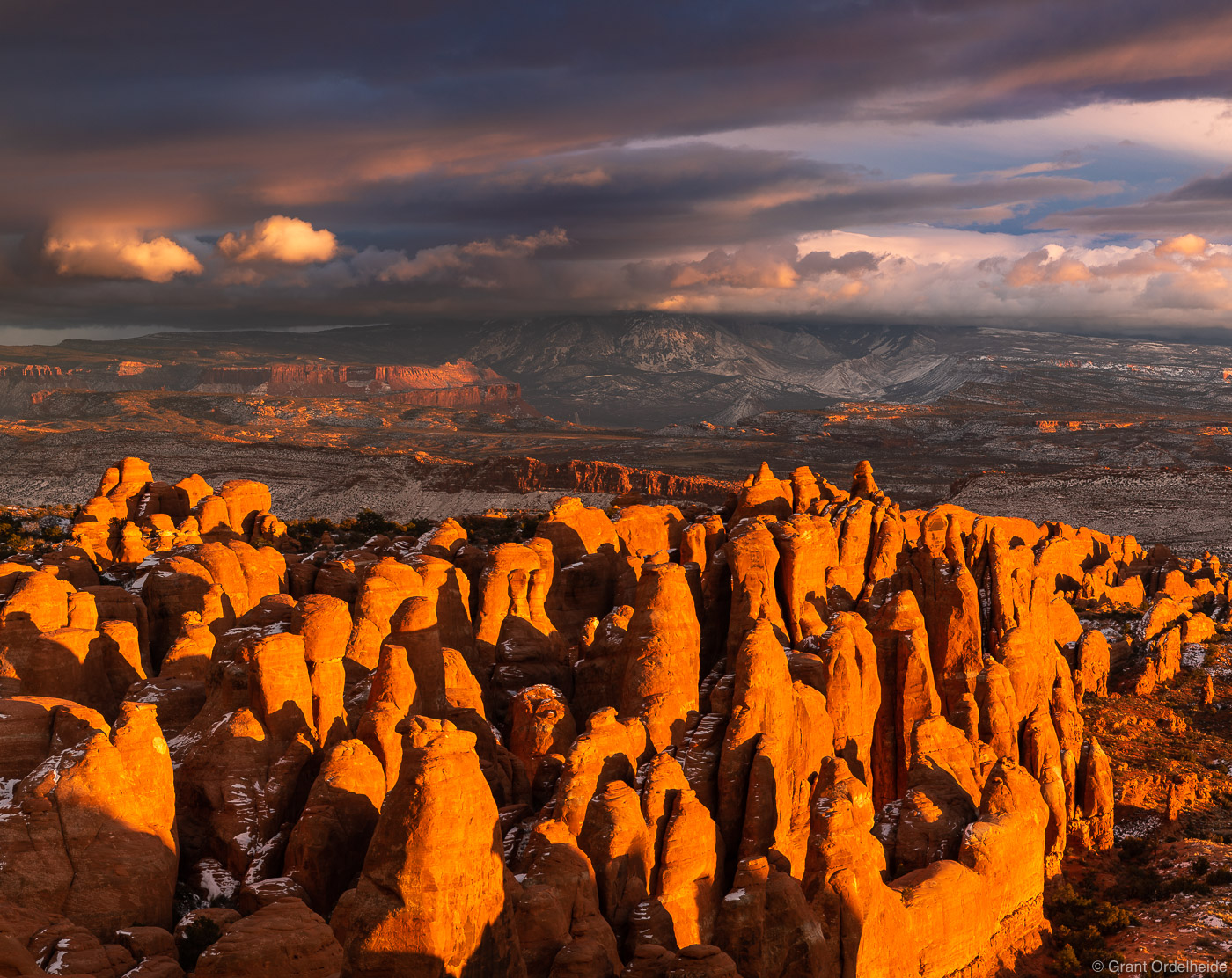 A dramatic winter sunset over the Fiery Furnace in Arches National Park.