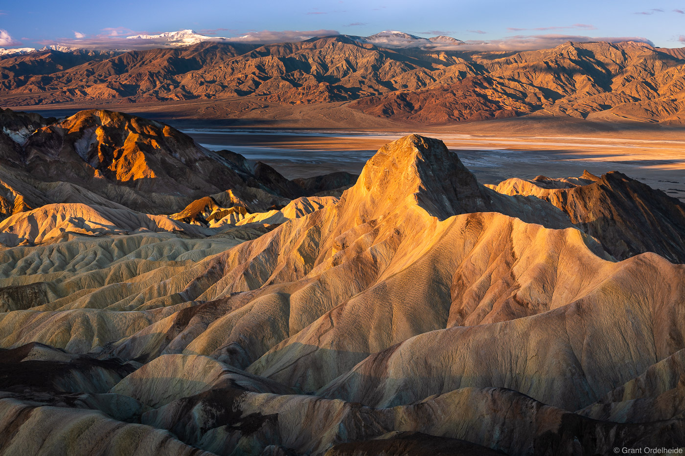 Sunrise over Manly Beacon and the Zabriskie badlands in Death Valley National Park.