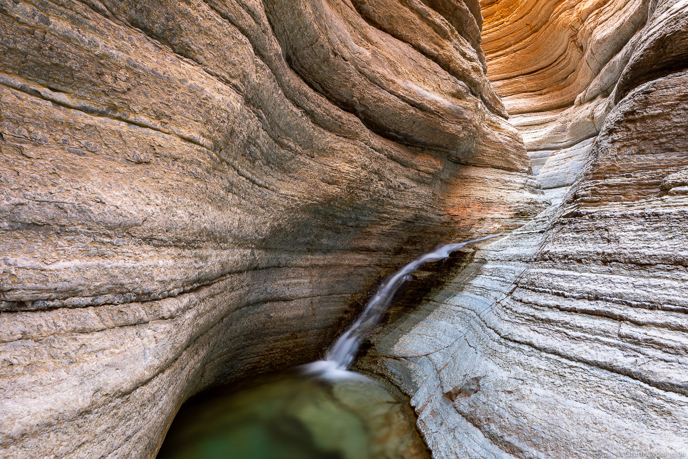 A small waterfall in Matkatamiba Canyon, a small side canyon of the Grand Canyon.
