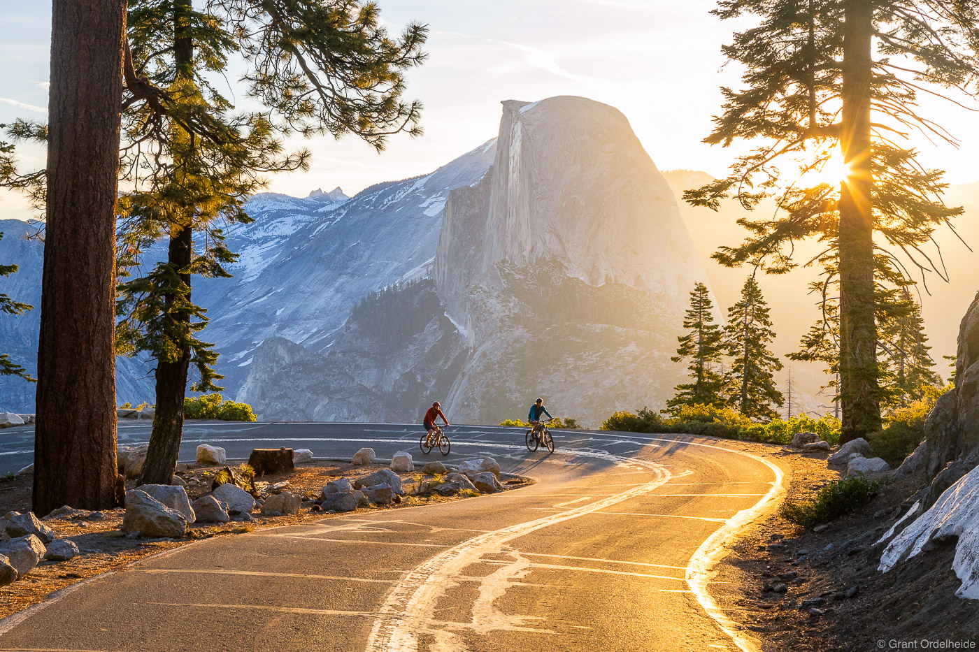 A pair of cyclists on the Glacier Point road in Yosemite National Park.