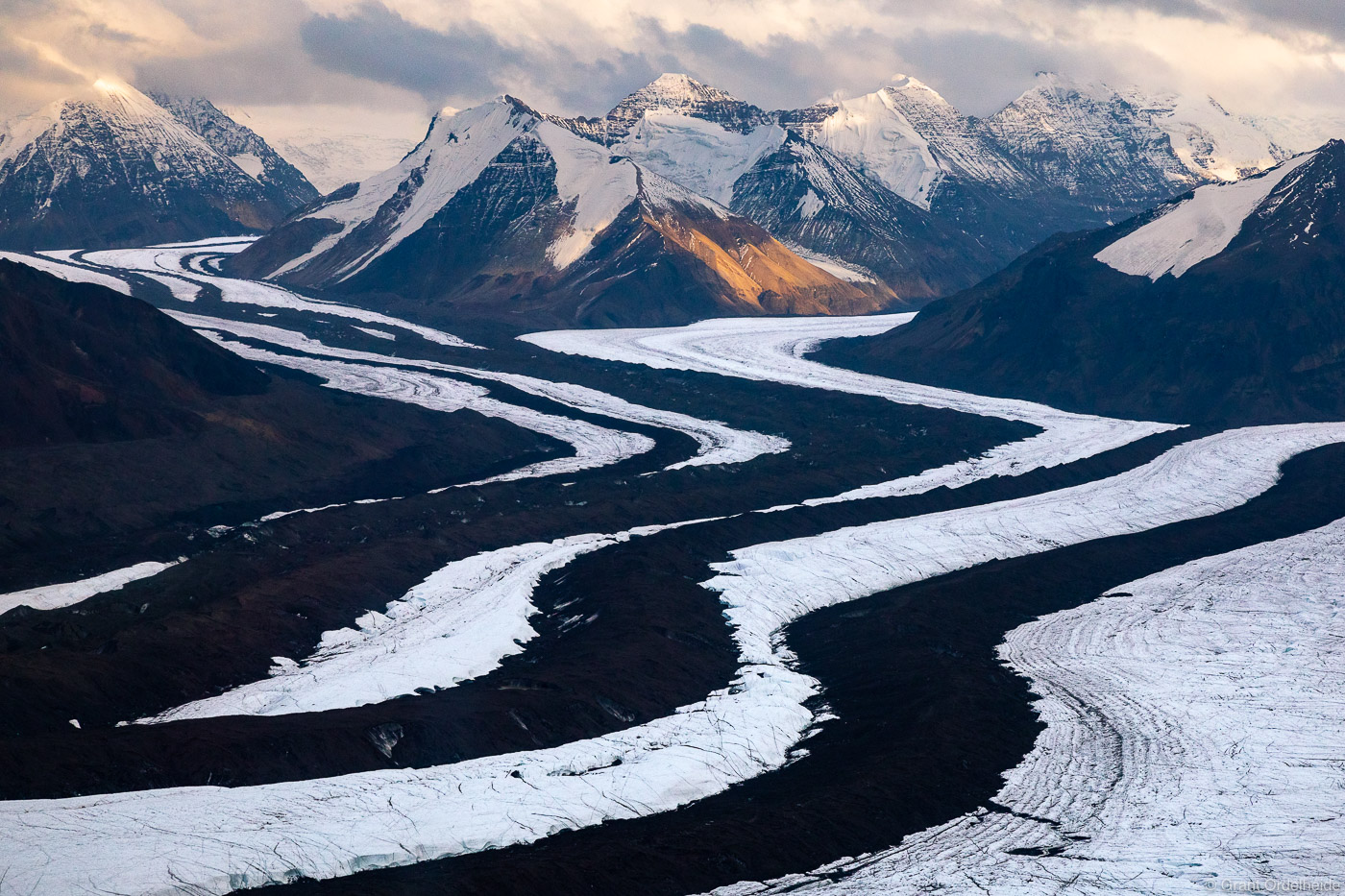 Aerial view of converging glaciers deep in Alaska's Wrangell - St. Elias National Park.