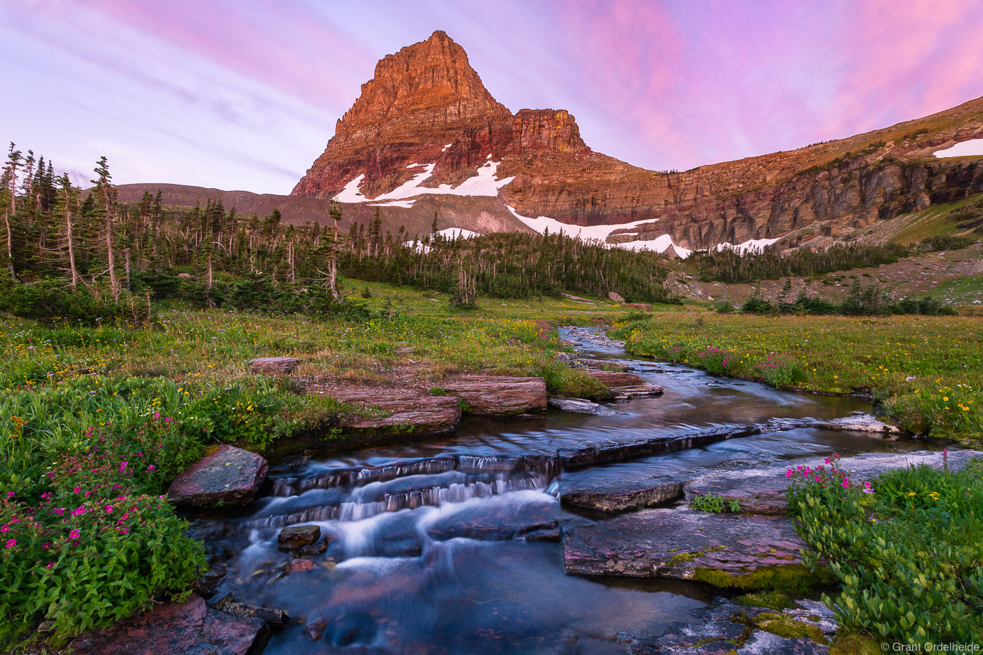 A summer sunrise over Clements Mountain in Montana's Glacier National Park.