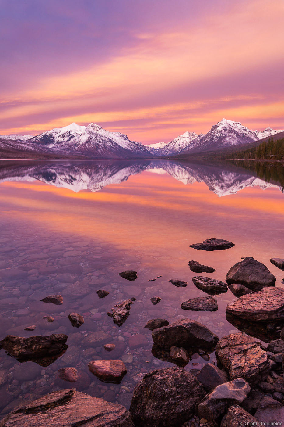 A fiery sunset over Lake McDonald in Montana's Glacier National Park.