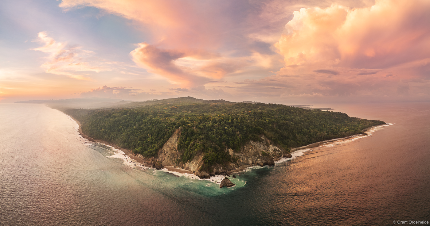 An aerial view of a sunset over Costa Rica's Osa Peninsula.