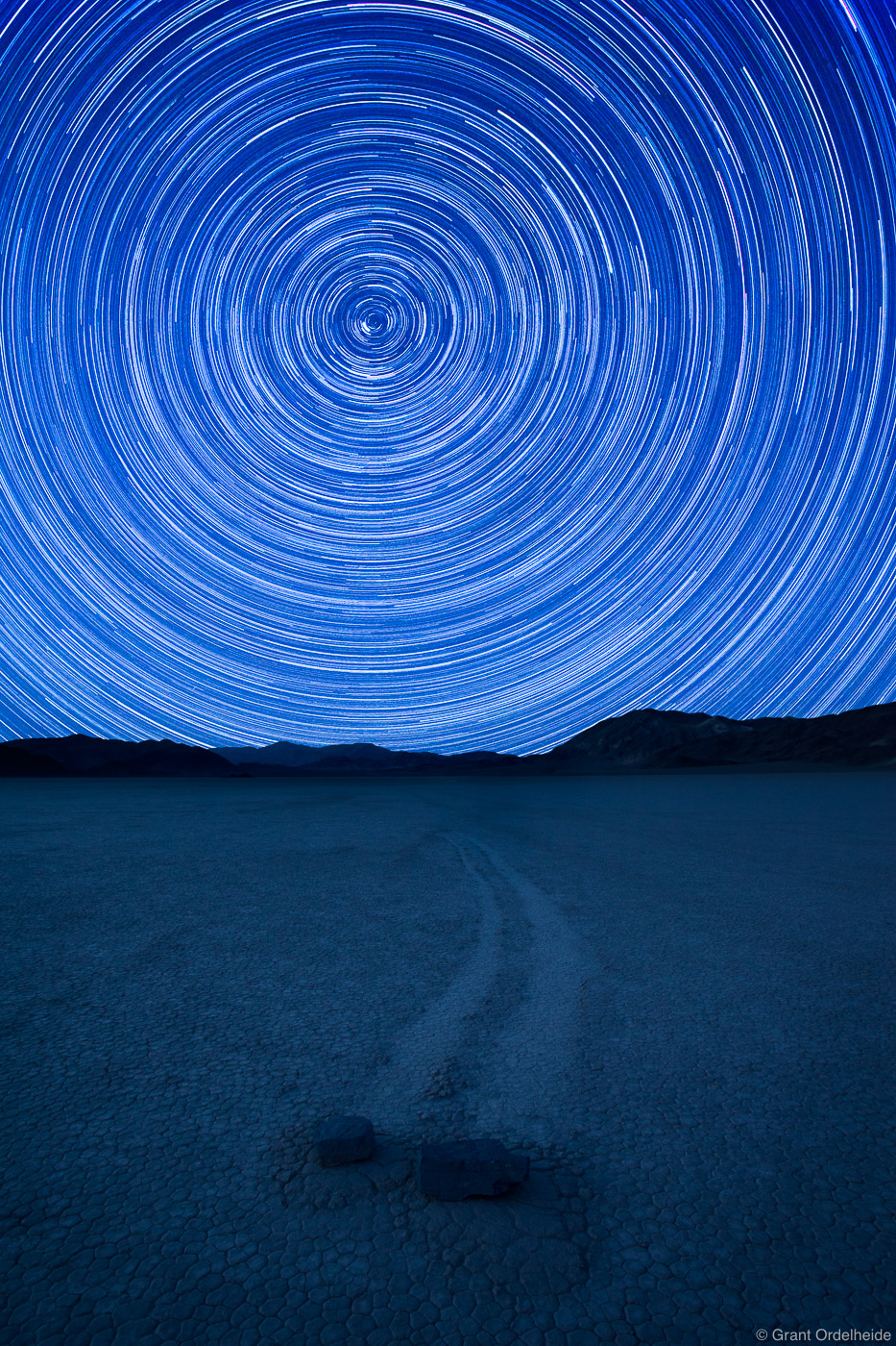 Star trails&nbsp;above the unique Racetrack Playa in Death Valley where rocks&nbsp;mysteriously move across the clay leaving...