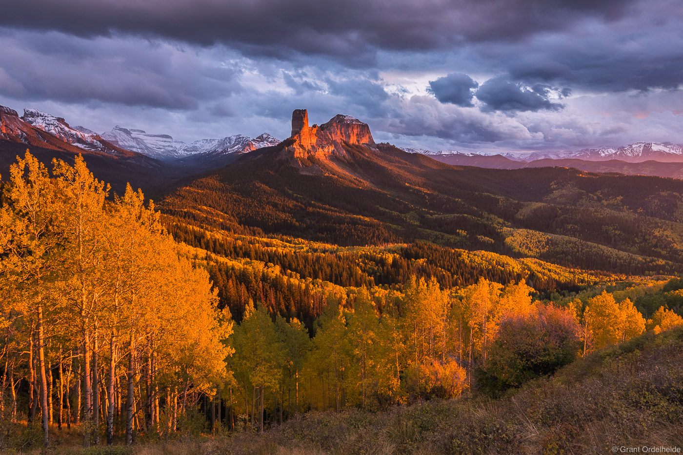 An autumn sunset over Chimney Rock and Courthouse Mountain near Ridgway Colorado.